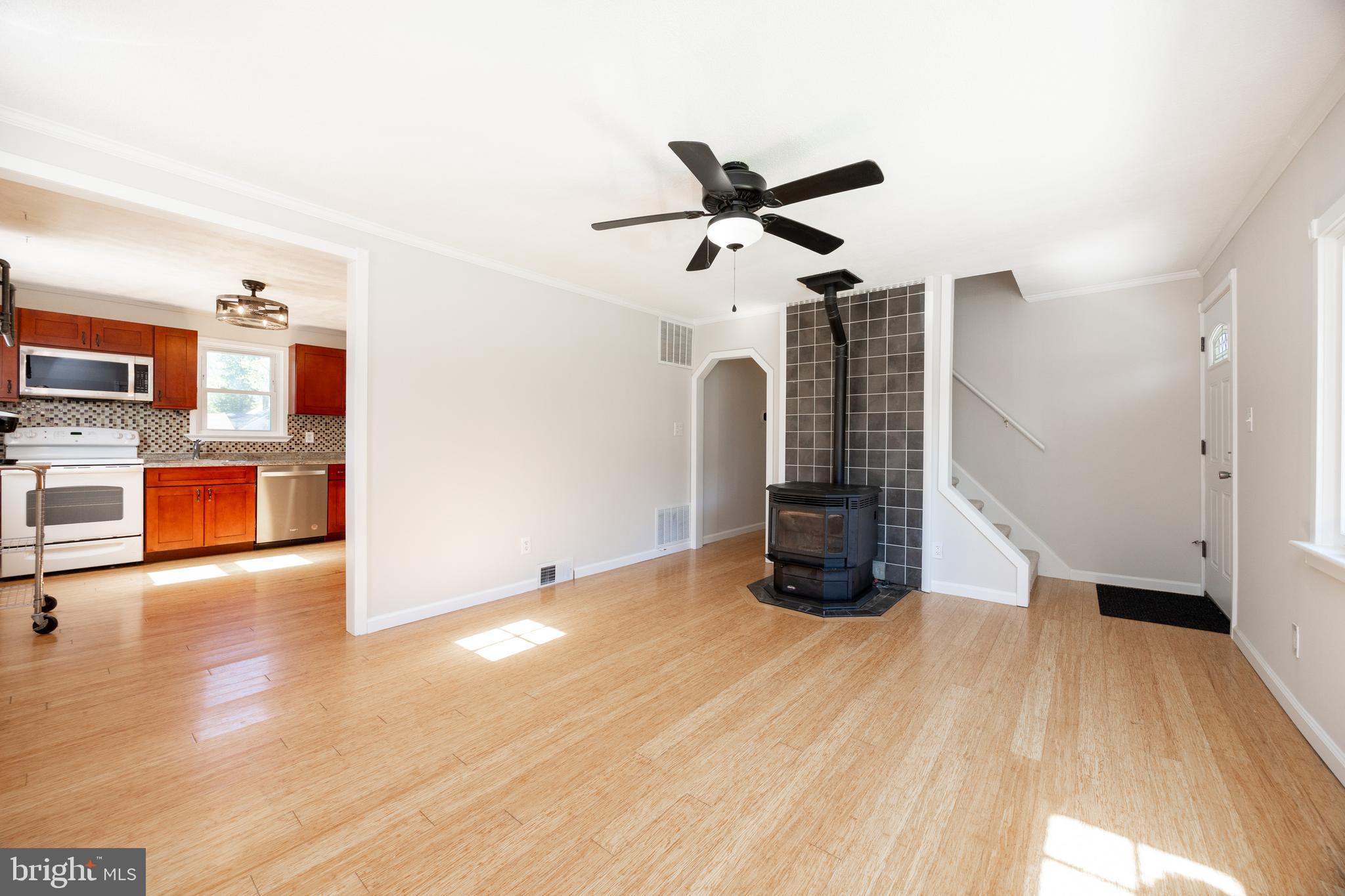 2405 Line Lexington Road Hatfield, PA 19440 - Photo 14 of 31 a view of a livingroom with wooden floor and a ceiling fan