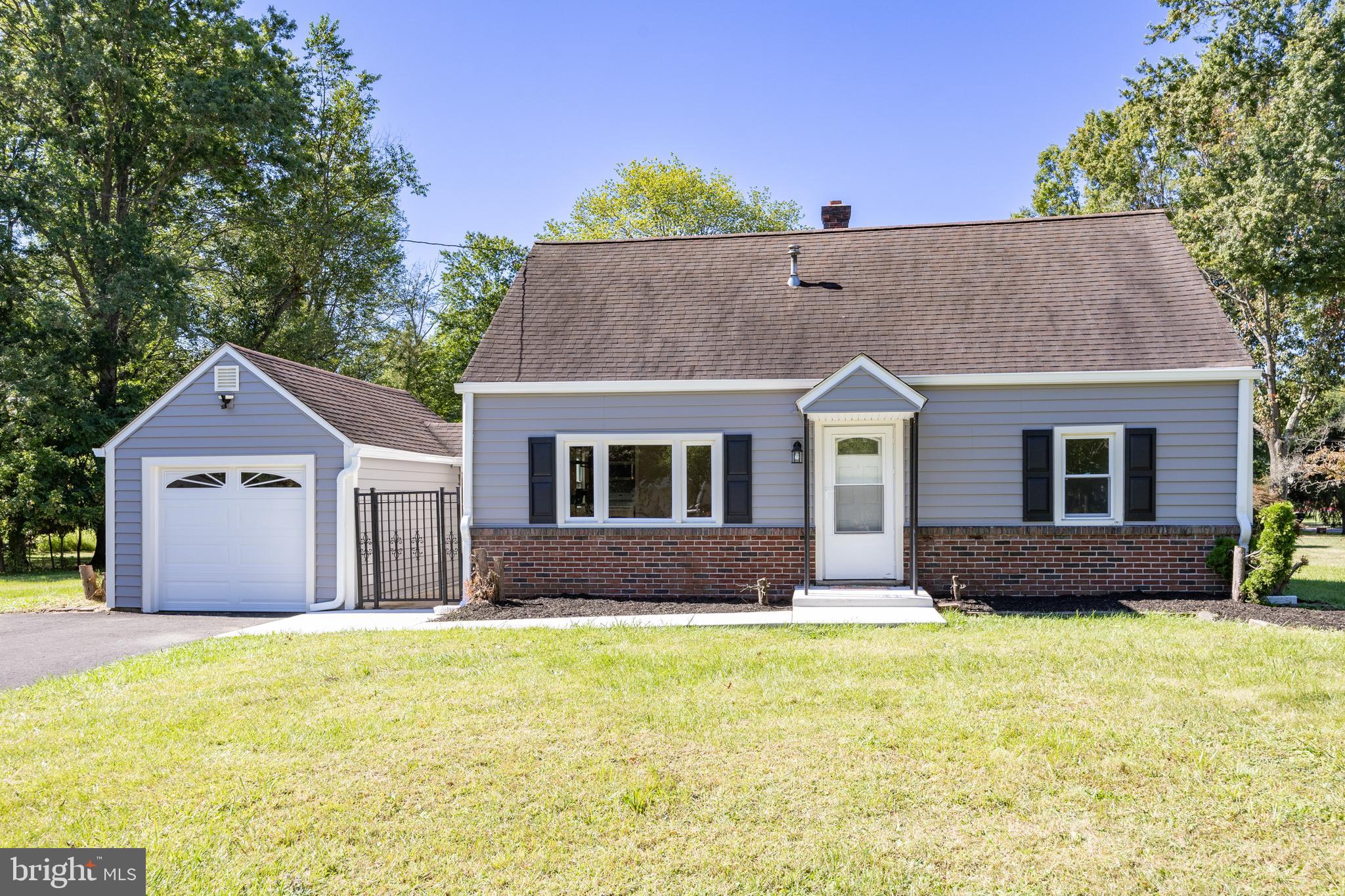 2405 Line Lexington Road Hatfield, PA 19440 - Photo 2 of 31 a front view of a house with a yard