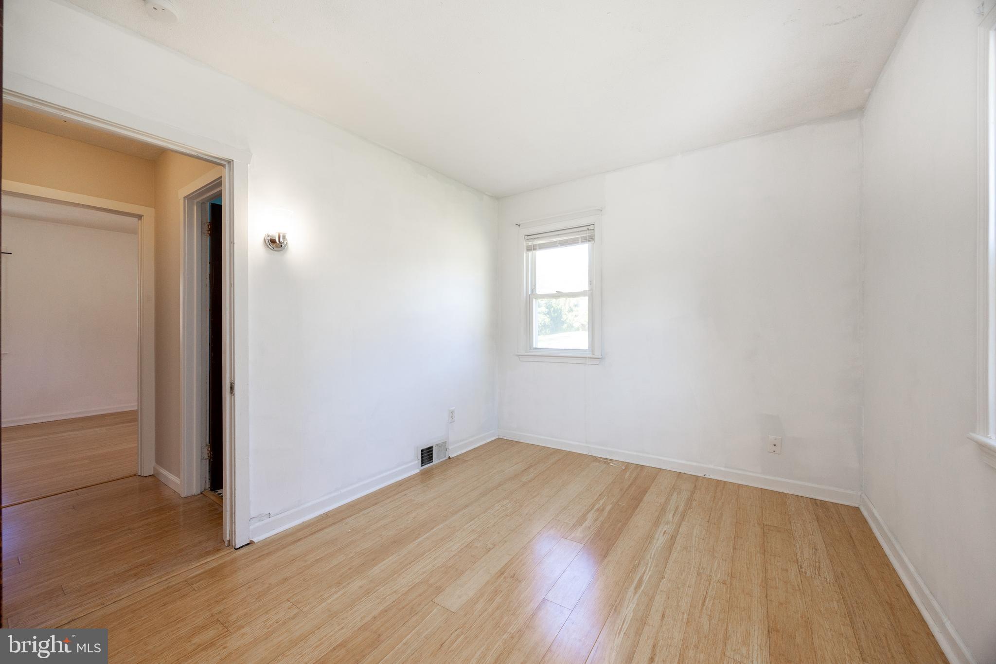 2405 Line Lexington Road Hatfield, PA 19440 - Photo 21 of 31 an empty room with wooden floor and windows