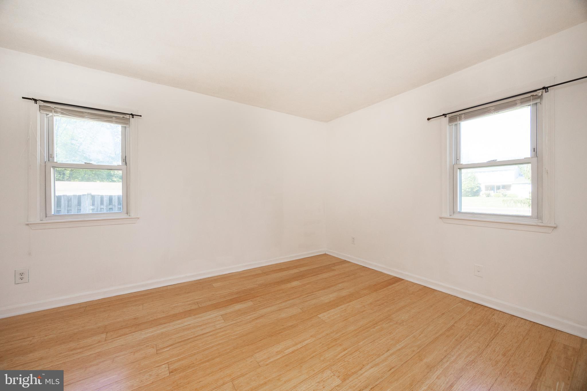 2405 Line Lexington Road Hatfield, PA 19440 - Photo 23 of 31 an empty room with wooden floor and windows