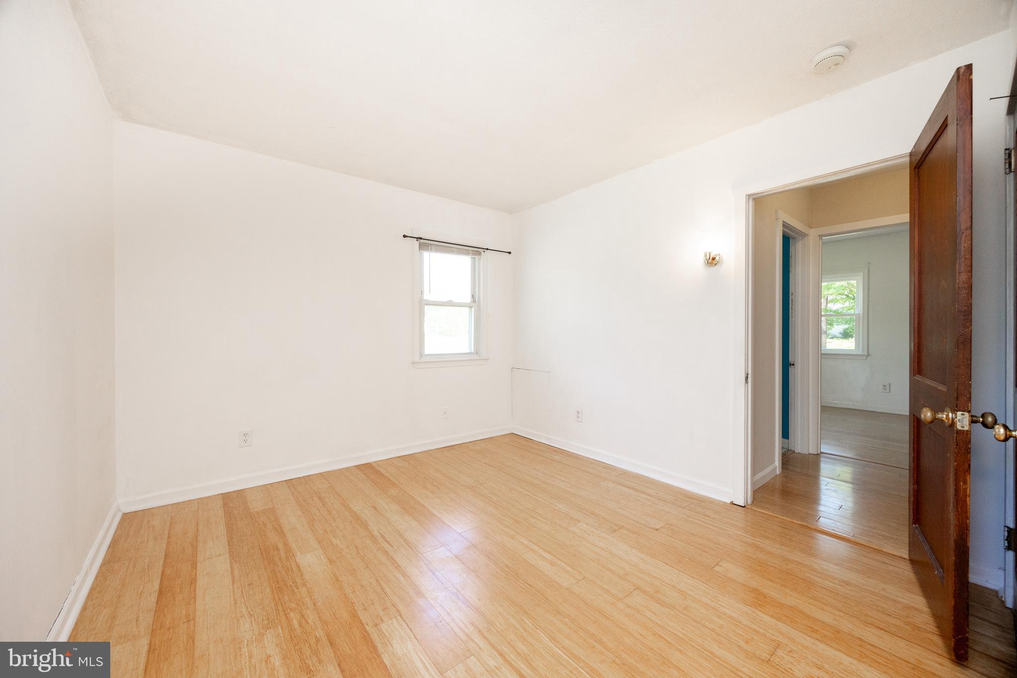 2405 Line Lexington Road Hatfield, PA 19440 - Photo 25 of 31 an empty room with wooden floor and windows