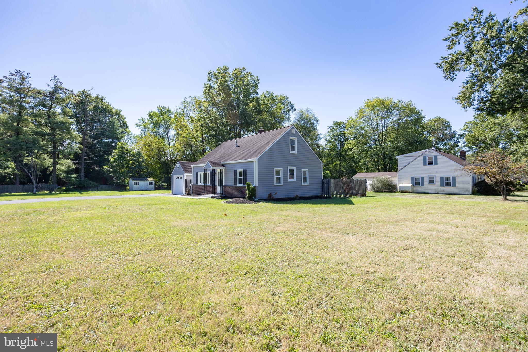 2405 Line Lexington Road Hatfield, PA 19440 - Photo 5 of 31 a front view of house with swimming pool and green space
