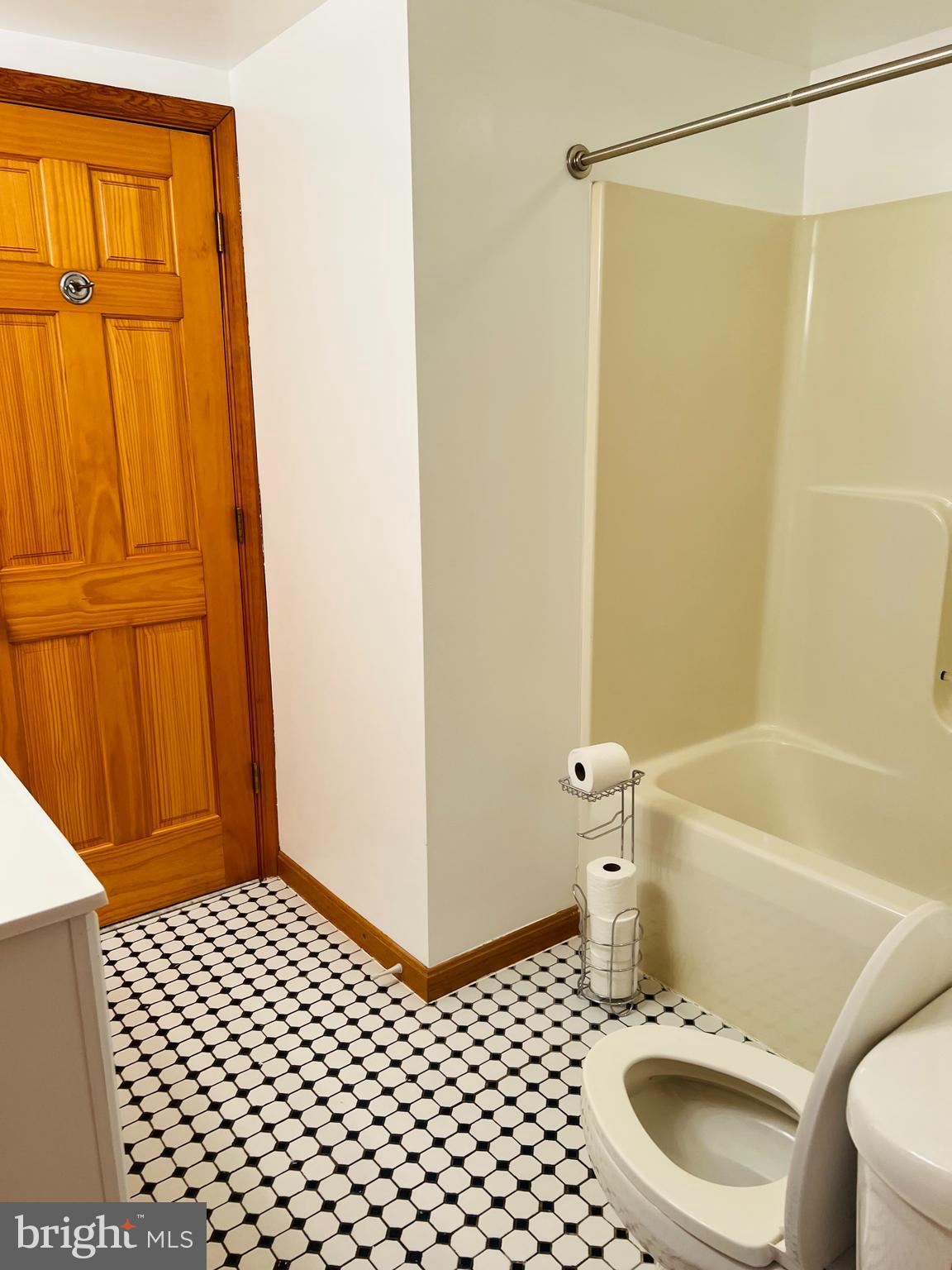 52 Salvington Road Fredericksburg, VA 22405 - Photo 12 of 34 a bathroom with a sink a toilet and shower