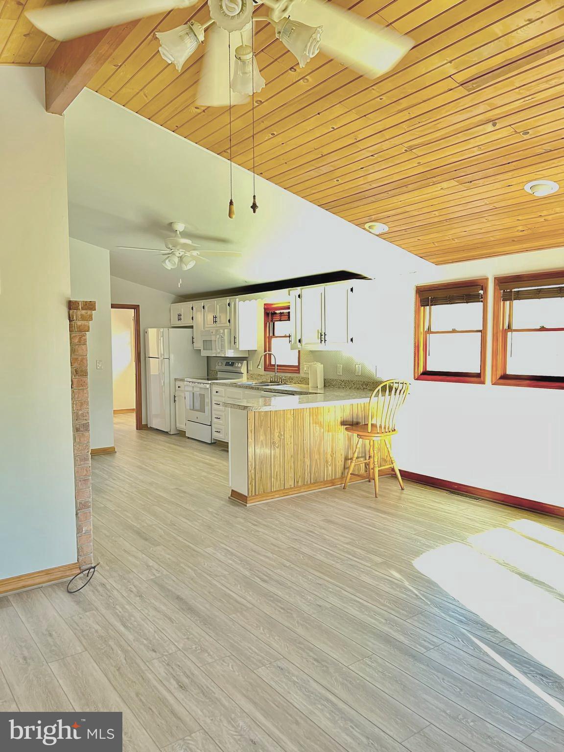 52 Salvington Road Fredericksburg, VA 22405 - Photo 18 of 34 a view of kitchen with furniture and wooden floor