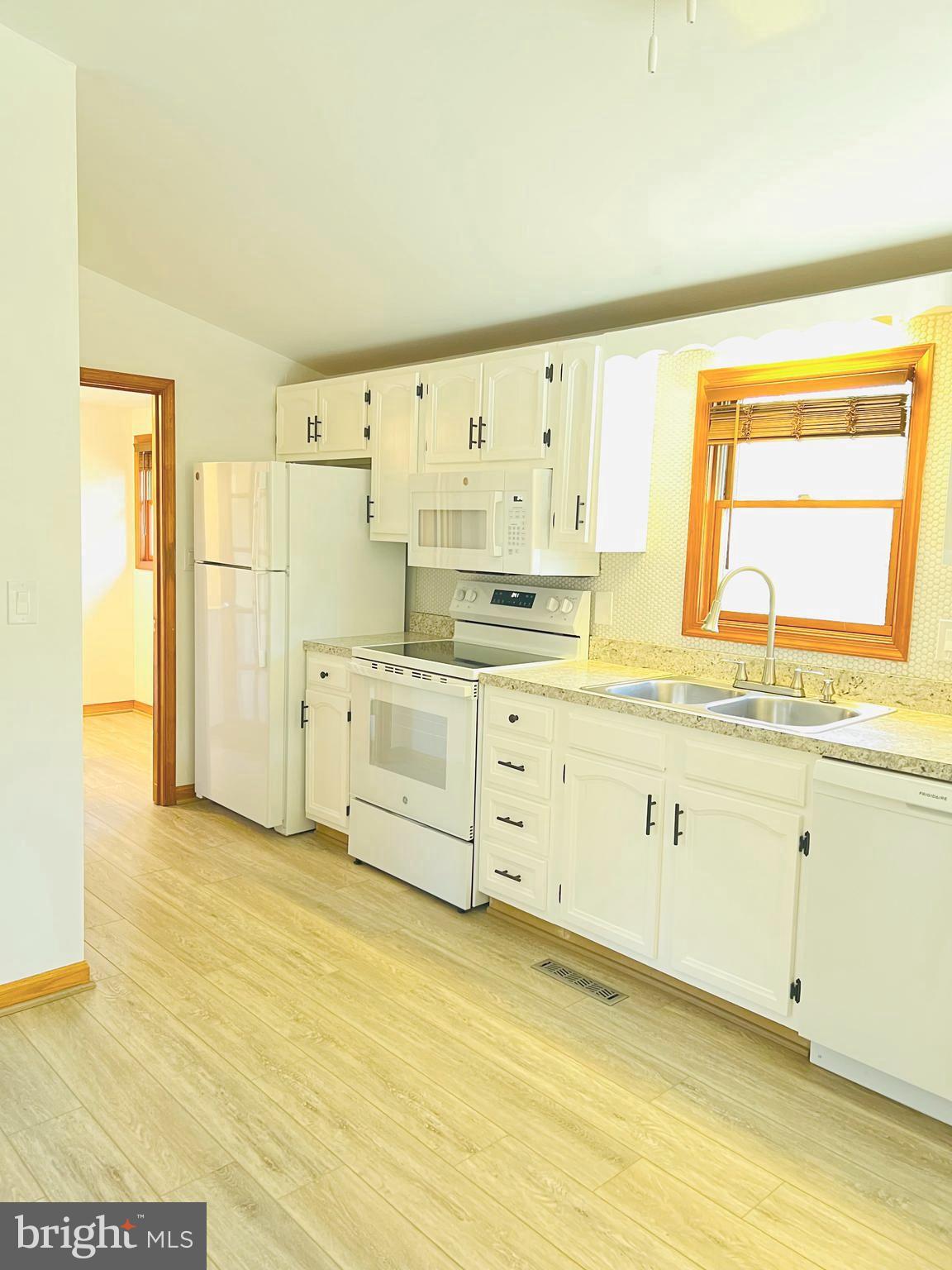 52 Salvington Road Fredericksburg, VA 22405 - Photo 21 of 34 a view of a kitchen with wooden floor