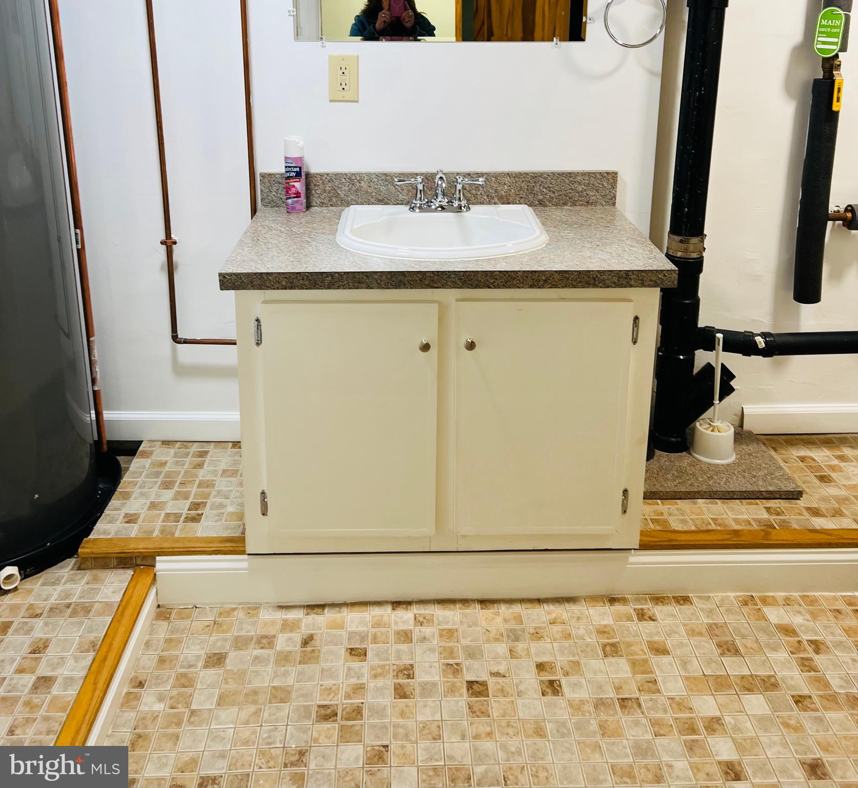 52 Salvington Road Fredericksburg, VA 22405 - Photo 29 of 34 a bathroom with a sink and a mirror