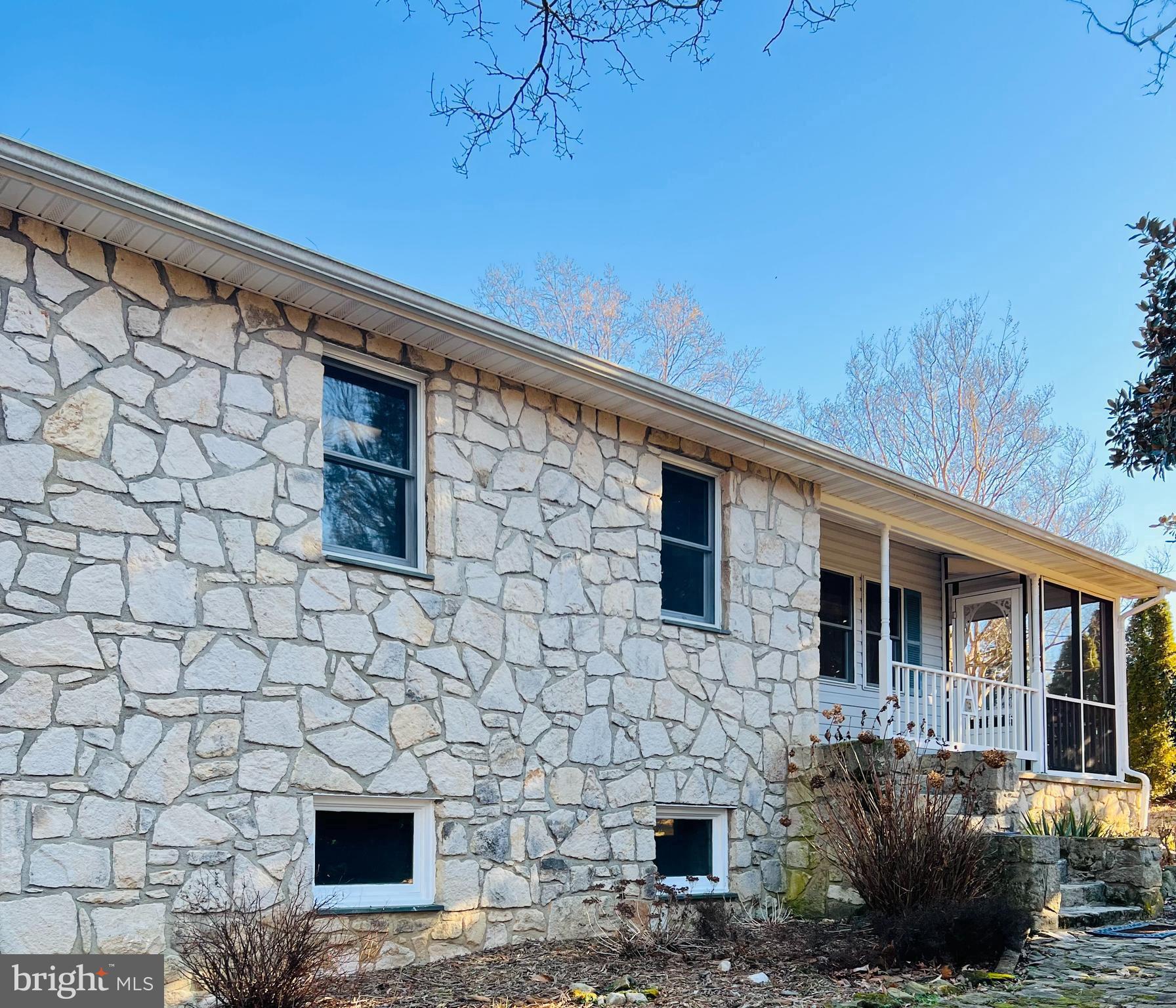 52 Salvington Road Fredericksburg, VA 22405 - Photo 4 of 34 a front view of a house with a yard