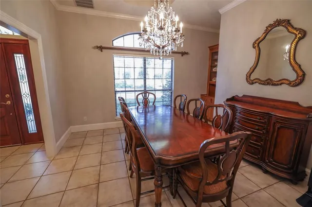 a kitchen with a stove and a white cabinets