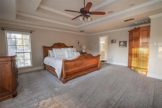 a bathroom with a tub shower and a sink
