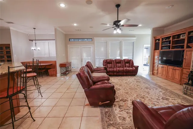 a view of a dining room with furniture and window