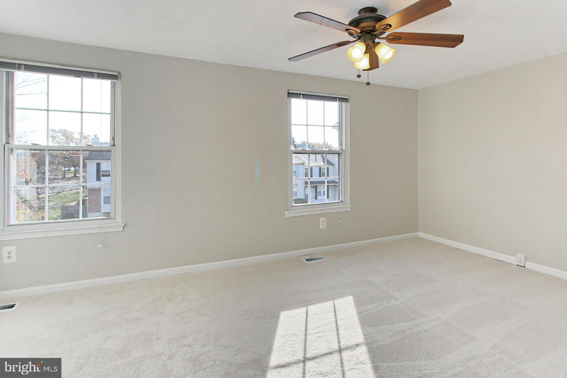 7406 Aspenpark Road Lorton, VA 22079 - Photo 15 of 33 Bright, spacious primary bdrm w/ample closet spac