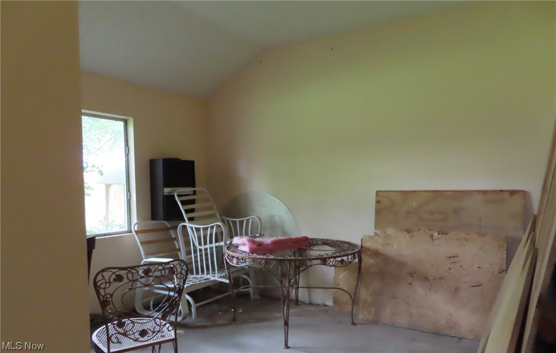182 Harcourt Road Vermilion, OH 44089 - Photo 23 of 29 Living area featuring lofted ceiling