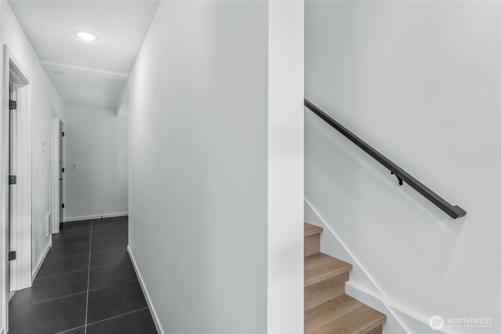 3510 Northeast 125th Street, Unit F Seattle, WA 98125 - Photo 3 of 24 a view of hallway with stairs