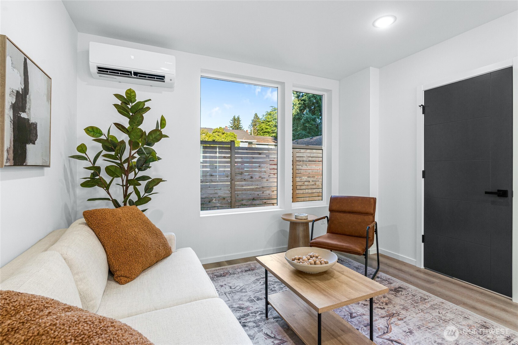 3510 Northeast 125th Street, Unit F Seattle, WA 98125 - Photo 10 of 24 a living room with furniture and a window