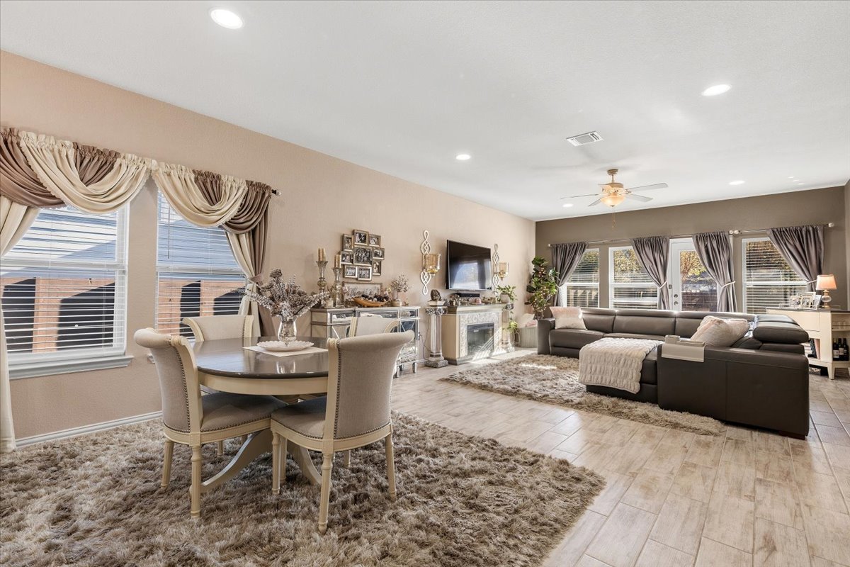 8721 Sikes Way Austin, TX 78747 - Photo 11 of 37 a living room with furniture and a table