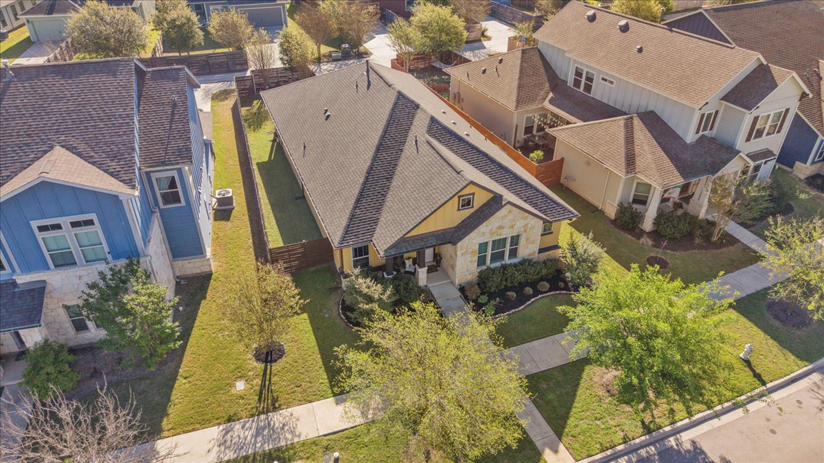 8721 Sikes Way Austin, TX 78747 - Photo 3 of 37 a aerial view of a house with a yard