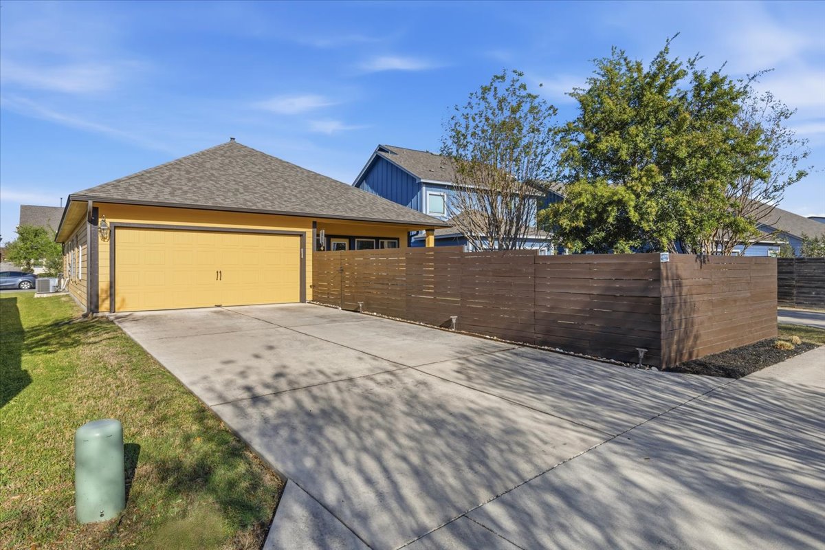 8721 Sikes Way Austin, TX 78747 - Photo 33 of 37 a front view of a house with a yard