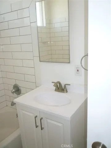 a view of empty room with windows