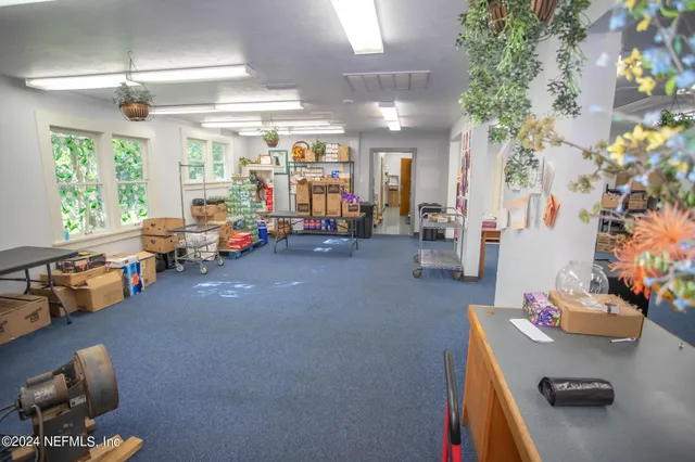 a room with furniture and a large window
