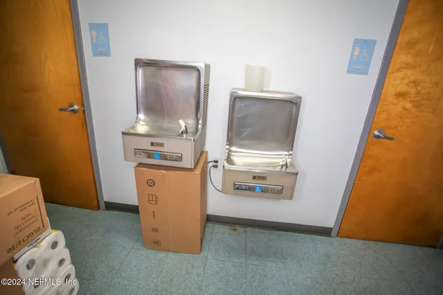 a view of kitchen and utility room