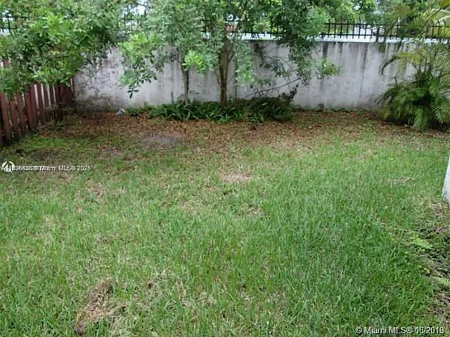 a view of outdoor space and yard