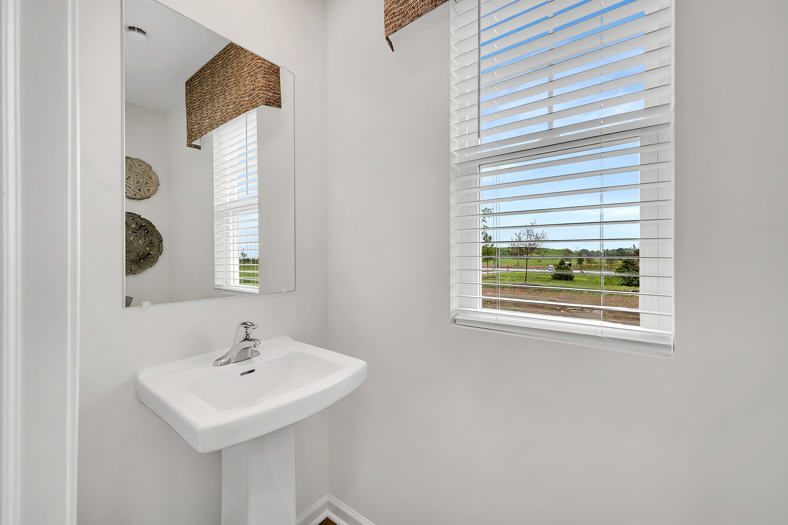 1331 Acadia Circle Pingree Grove, IL 60140 - Photo 38 of 51 a bathroom with a sink and a mirror