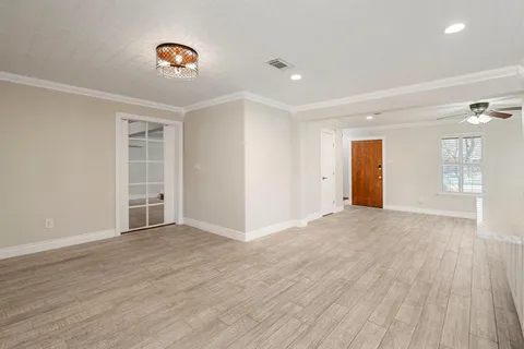 a view of kitchen with wooden floor