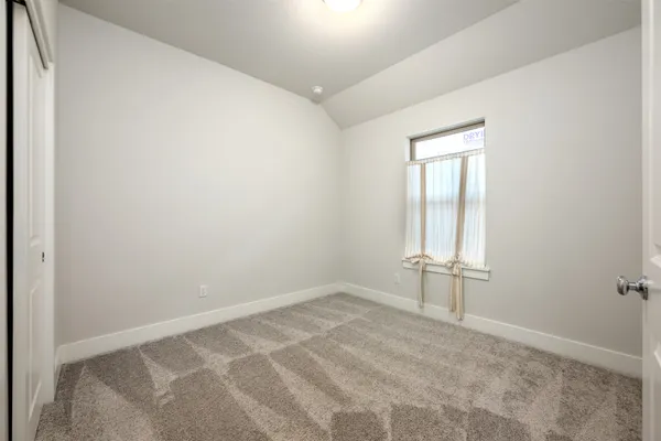 an empty room with closet