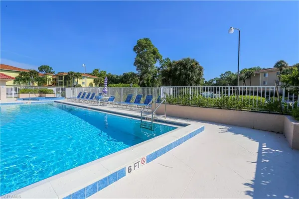 a view of a swimming pool with a terrace
