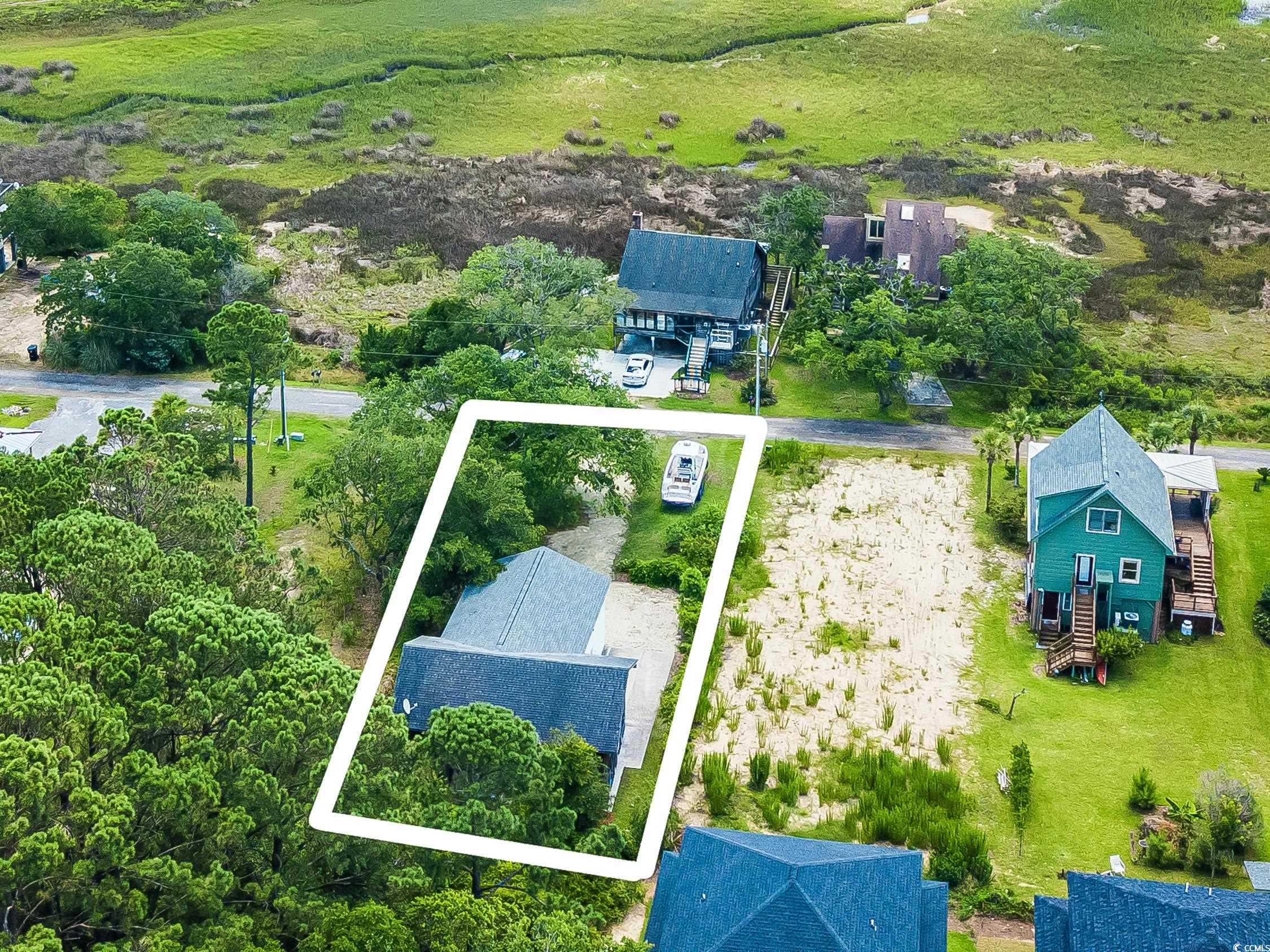127 Brown Pelican Loop Pawleys Island, SC 29585 - Photo 25 of 31 Aerial overview of property's location with property boundaries highlighted