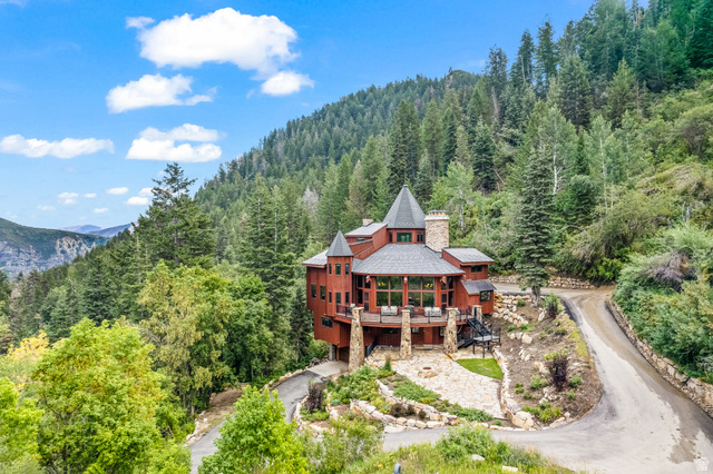 2687 Stewart Road Sundance, UT 84604 - Photo 25 of 48 View from above of property with a heavily wooded area and a mountainous background