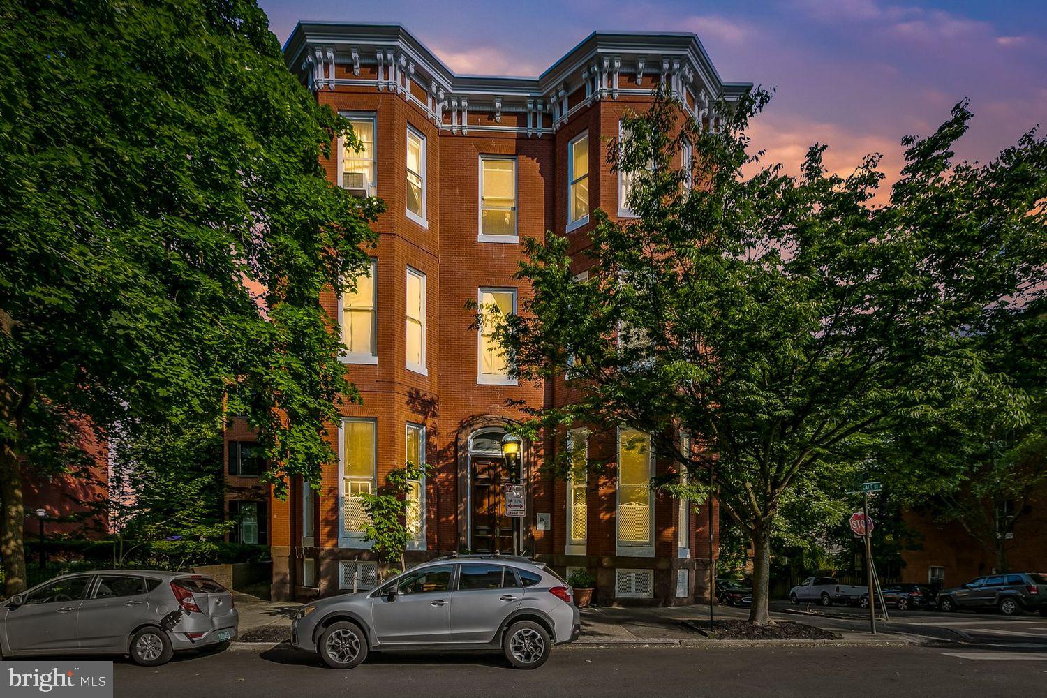 159 West Lanvale Street, Unit 5 Baltimore, MD 21201 - Photo 2 of 34 a view of a cars parked in front of a building