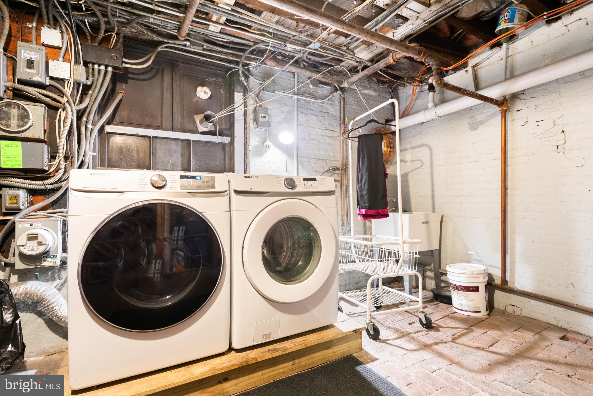 159 West Lanvale Street, Unit 5 Baltimore, MD 21201 - Photo 27 of 34 a utility room with dryer and washer