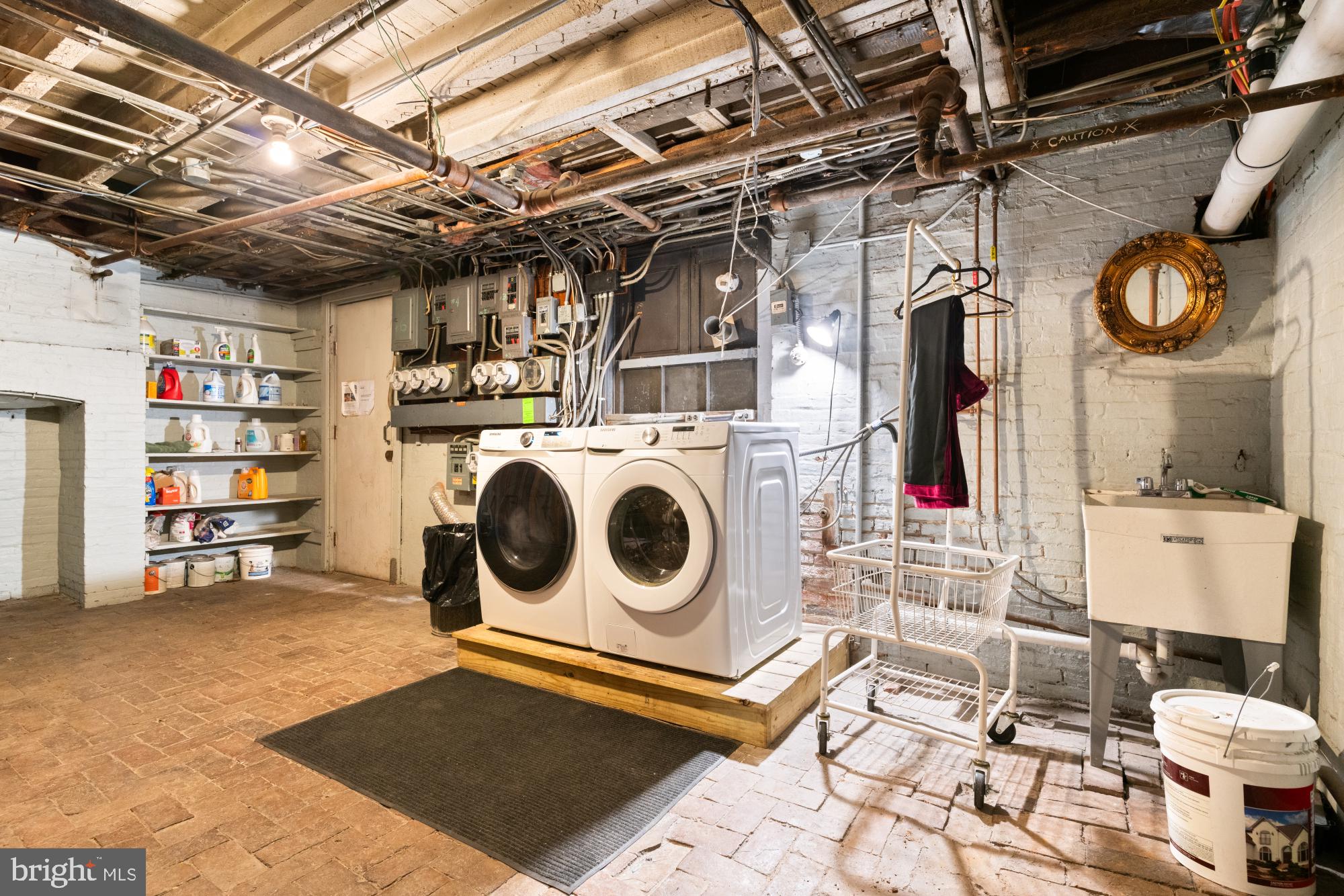 159 West Lanvale Street, Unit 5 Baltimore, MD 21201 - Photo 28 of 34 a utility room with dryer and washer