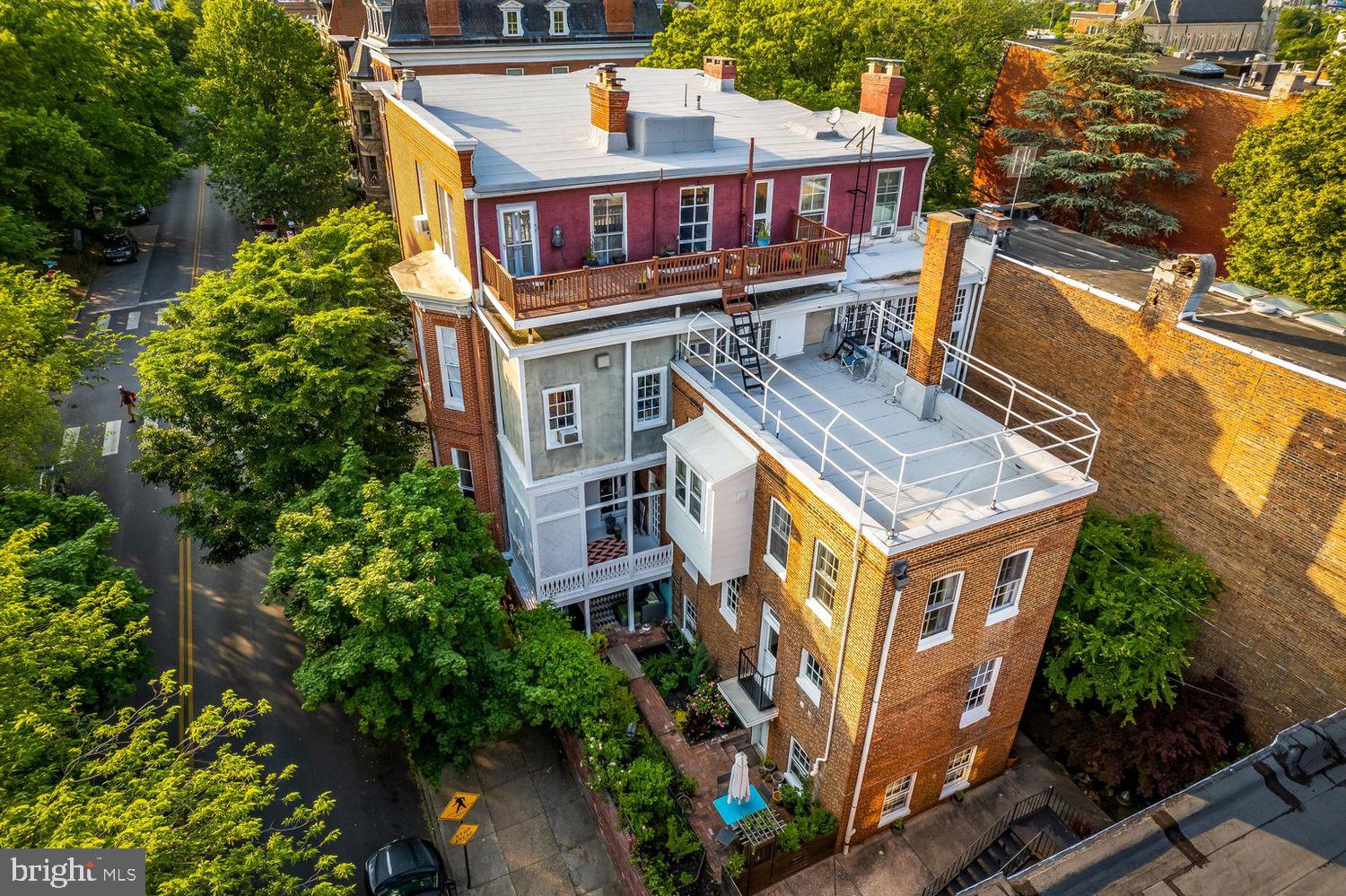 159 West Lanvale Street, Unit 5 Baltimore, MD 21201 - Photo 33 of 34 an aerial view of a house with a yard