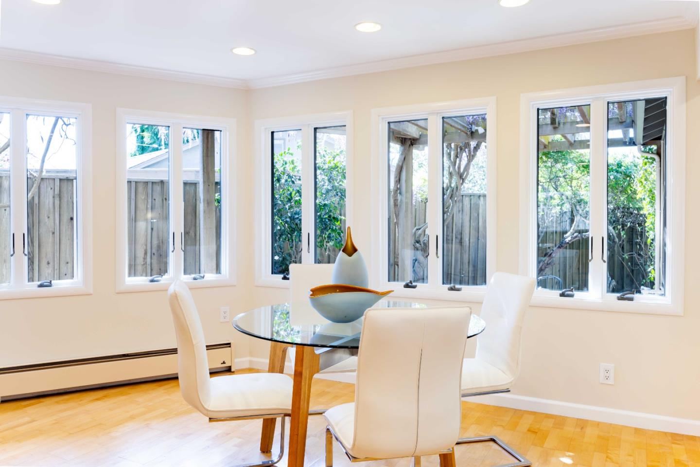 3241 Greer Road Palo Alto, CA 94303 - Photo 13 of 26 a view of a dining room with furniture and windows