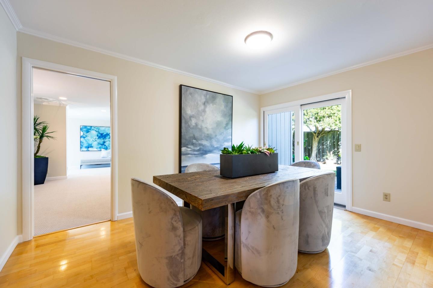 3241 Greer Road Palo Alto, CA 94303 - Photo 15 of 26 a dining room with furniture and wooden floor