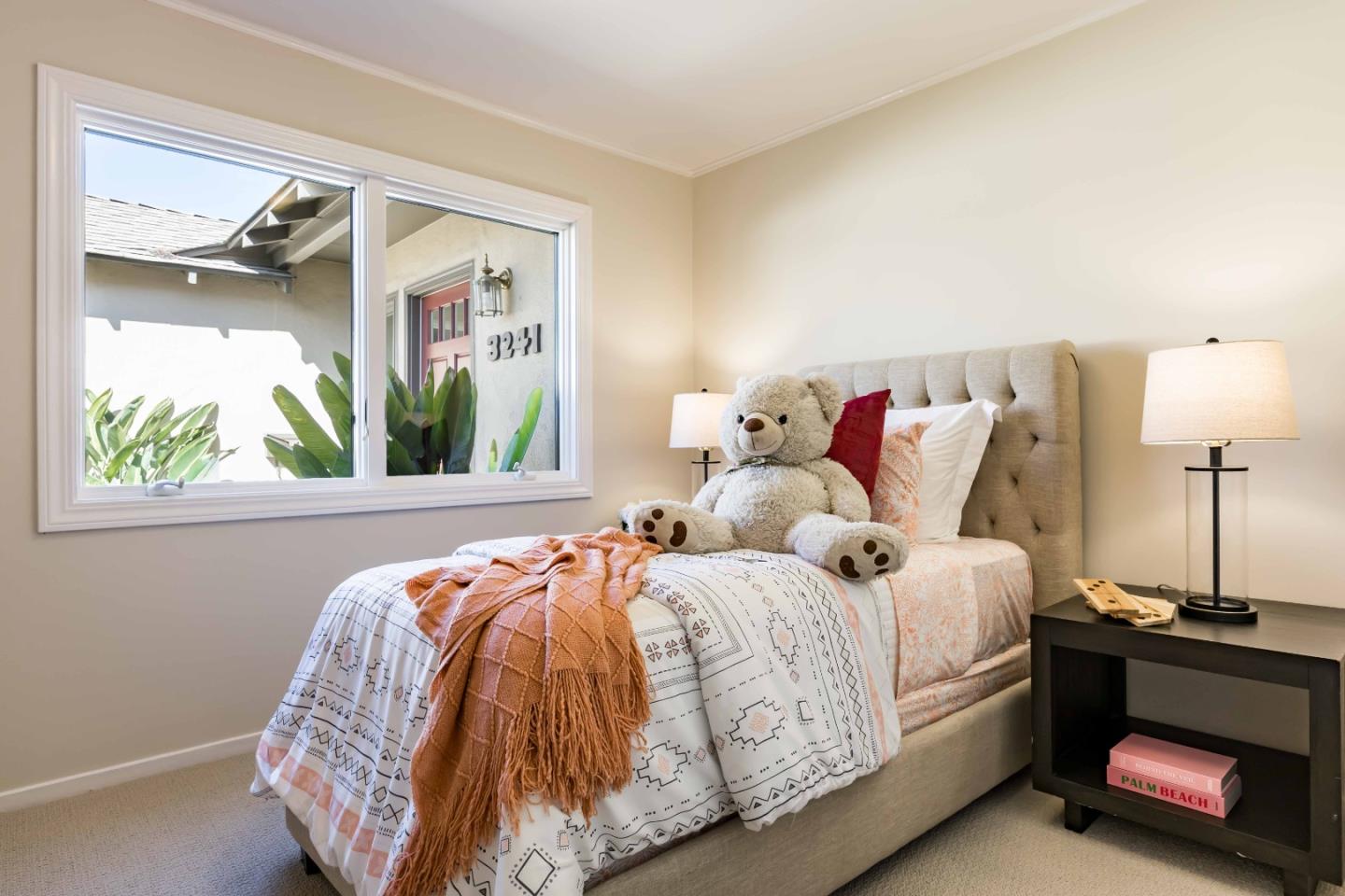 3241 Greer Road Palo Alto, CA 94303 - Photo 16 of 26 a bedroom with a bed and a window