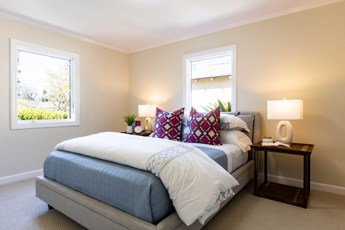 3241 Greer Road Palo Alto, CA 94303 - Photo 17 of 26 a bedroom with a bed and a lamp