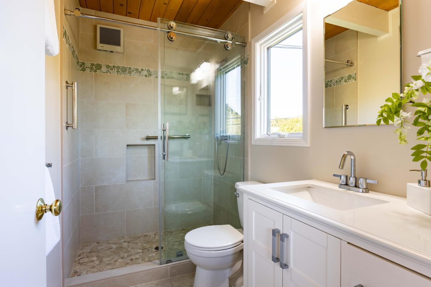 3241 Greer Road Palo Alto, CA 94303 - Photo 21 of 26 a bathroom with a sink toilet and shower