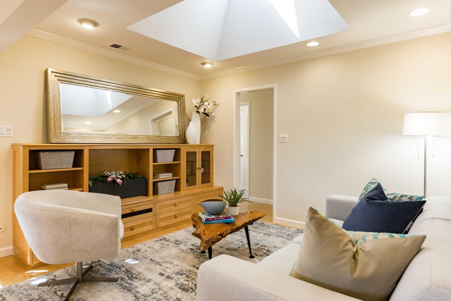 3241 Greer Road Palo Alto, CA 94303 - Photo 9 of 26 a living room with furniture and a mirror