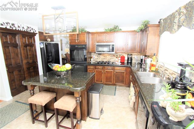 8580 Del Rio Road Peyton, CO 80831 - Photo 7 of 34