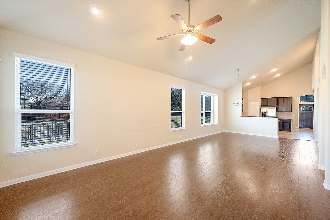 13720 Loleta Way Austin, TX 78717 - Photo 15 of 29 a view of an empty room with window and wooden floor