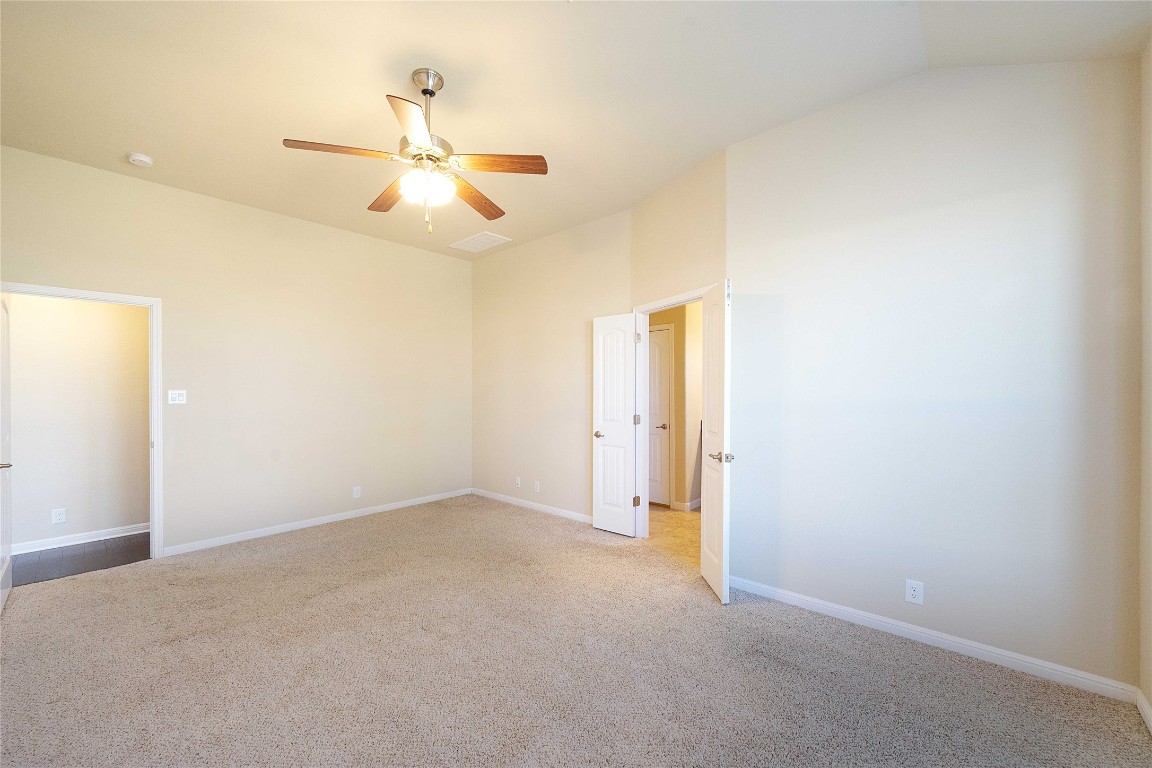 13720 Loleta Way Austin, TX 78717 - Photo 17 of 29 an empty room with windows and fan