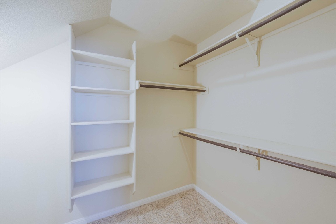 13720 Loleta Way Austin, TX 78717 - Photo 20 of 29 a view of walk in closet with empty racks
