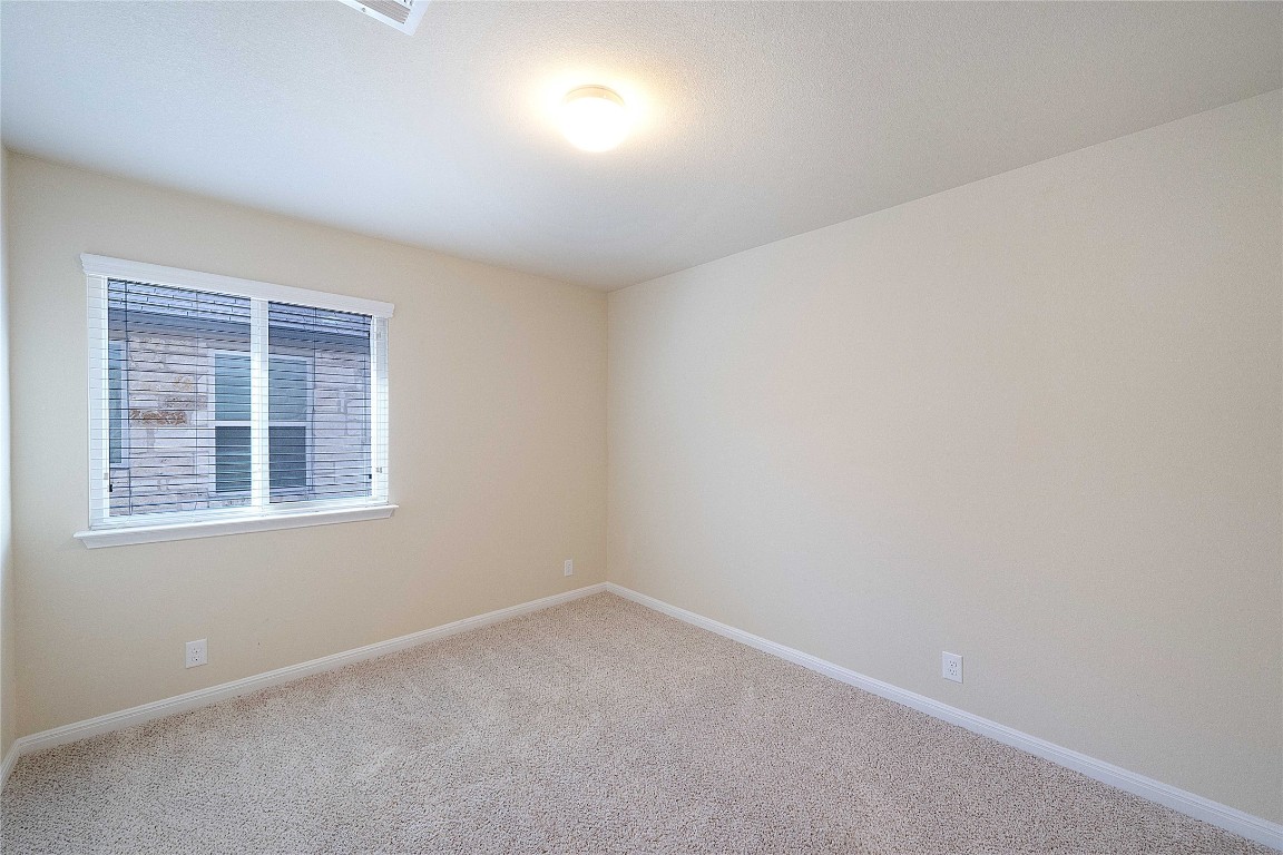 13720 Loleta Way Austin, TX 78717 - Photo 22 of 29 an empty room with a window