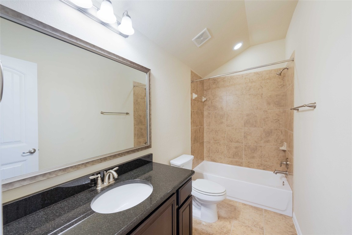 13720 Loleta Way Austin, TX 78717 - Photo 29 of 29 a bathroom with a sink and a mirror