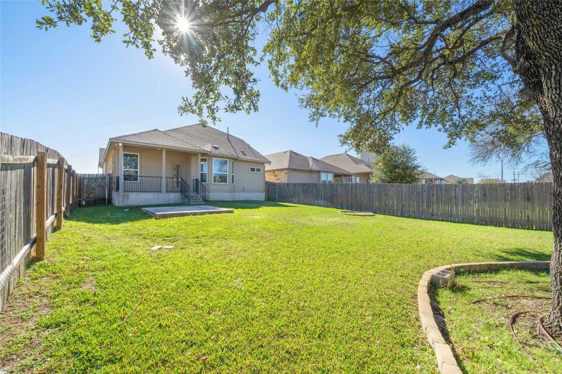 13720 Loleta Way Austin, TX 78717 - Photo 7 of 29 a view of a house with a swimming pool