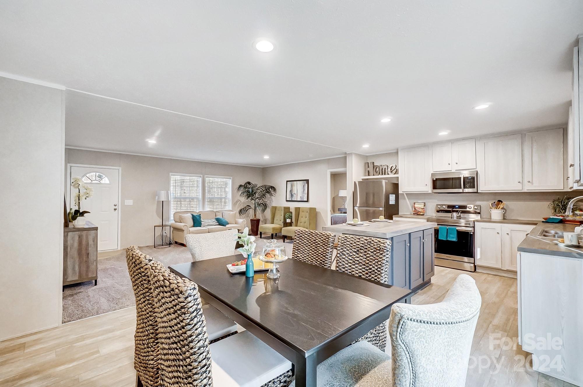 1860 Bascom Lane Midland, NC 28107 - Photo 9 of 27 a large kitchen with a table and chairs