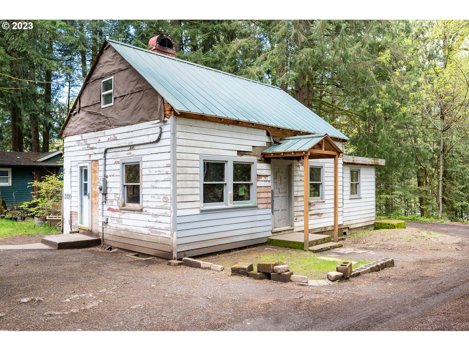 59191 Southeast Chalet Place Sandy, OR 97055 - Photo 13 of 25 a view of a house with a backyard